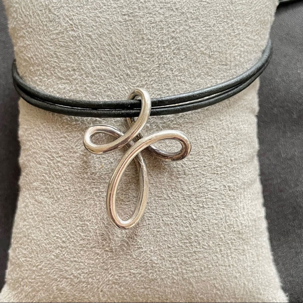 Free form silver cross